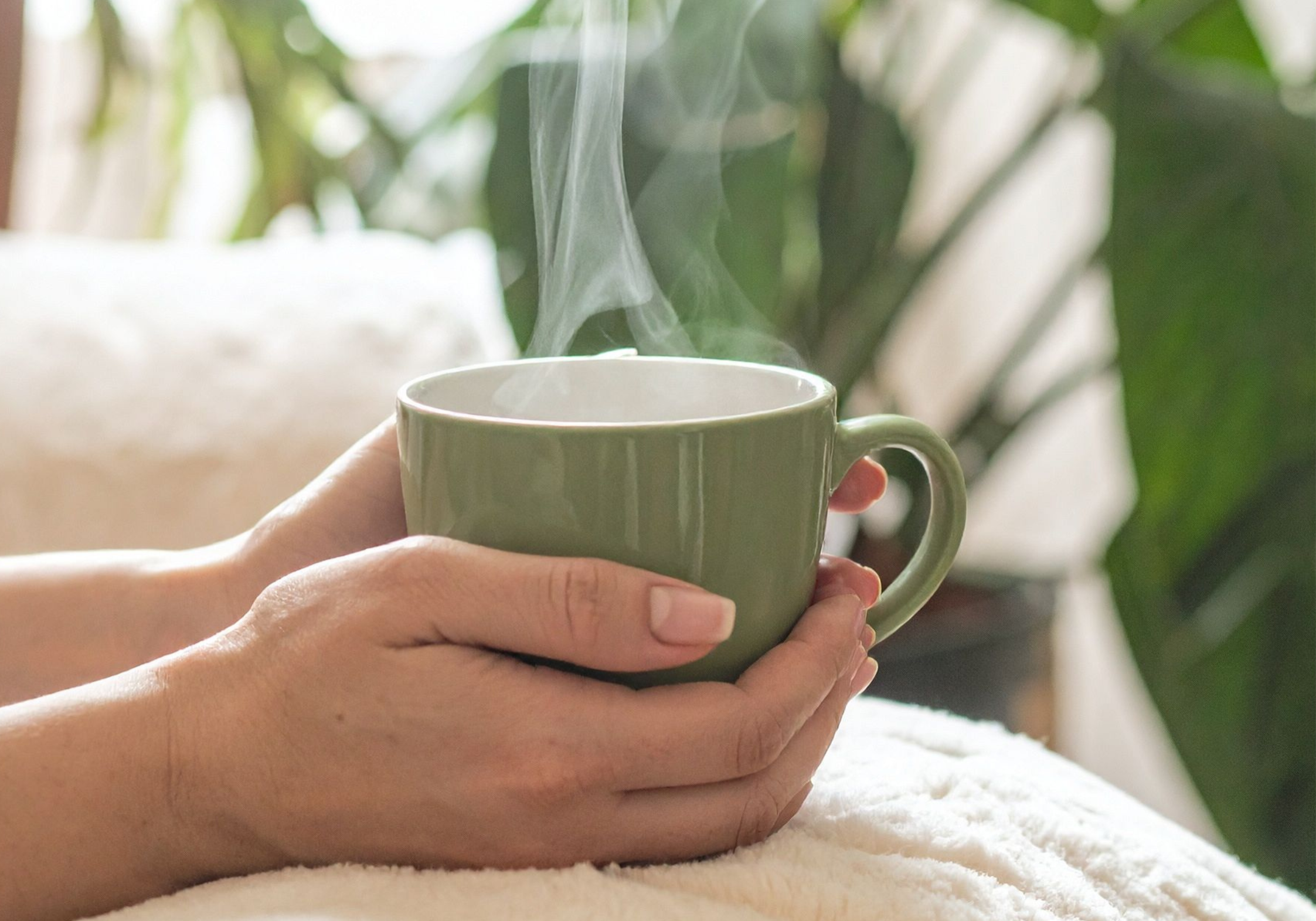 Midlife woman holding mug in reflection Reflection for rediscovery in midlife